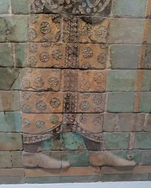 Royal bodyguards, relief at Darius palace, solar disc, sun disc symbols on their garments, located at the Pergamon Museum